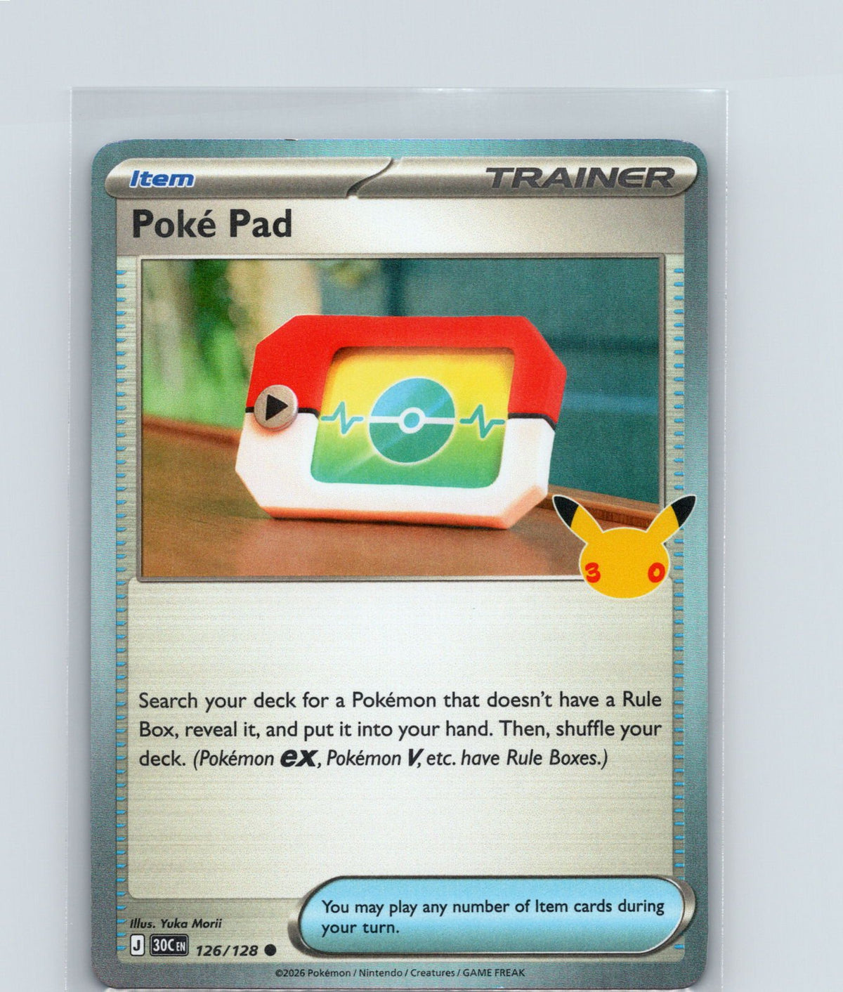 Poke Pad Holo Common ME: 30th Celebration 126/128 NM